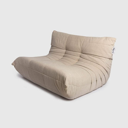 Ariika Mellow Couch Begie Indoor 130W x 102L x 80H, crafted to high standards for ultimate comfort, with memory foam and high-density sponge cushion seating.