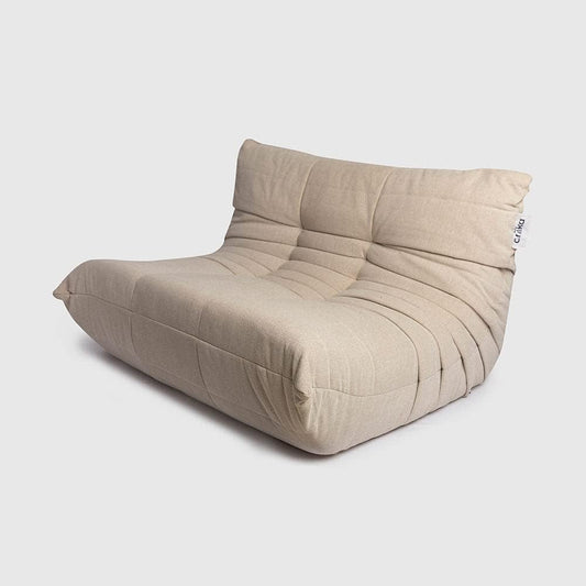Ariika Mellow Couch Begie Indoor 130W x 102L x 80H, crafted to high standards for ultimate comfort, with memory foam and high-density sponge cushion seating.