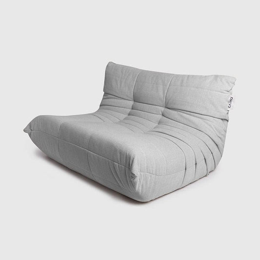 Ariika Mellow Couch Grey Indoor 130W x 102L x 80H, crafted to high standards for ultimate comfort, with memory foam and high-density sponge cushion seating.